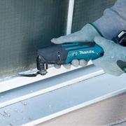 Різак мультифункціональний Makita BTM50RFJX4